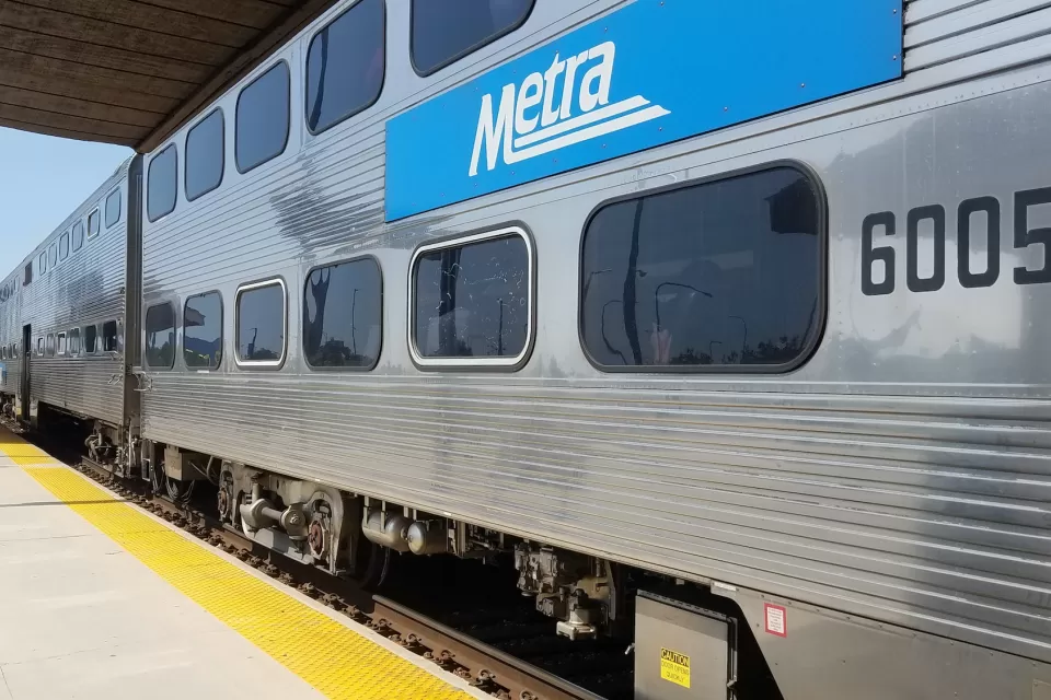Metra train stopped at station